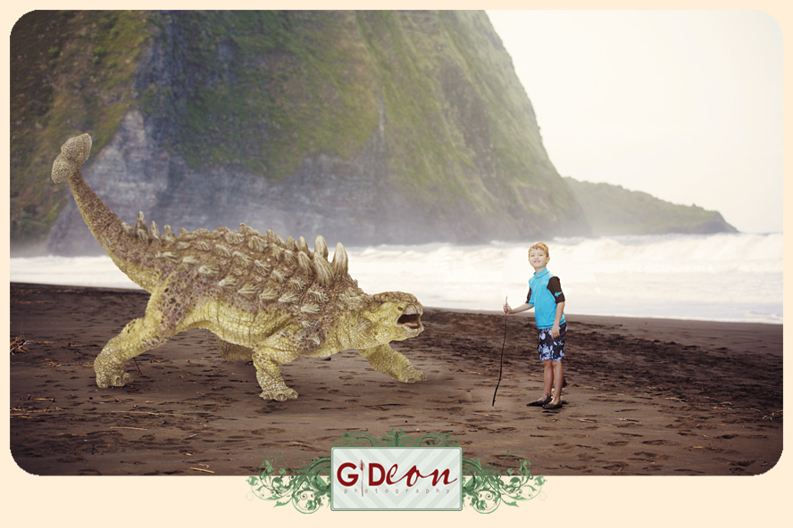 boy and dinosaur in hawaii on beach